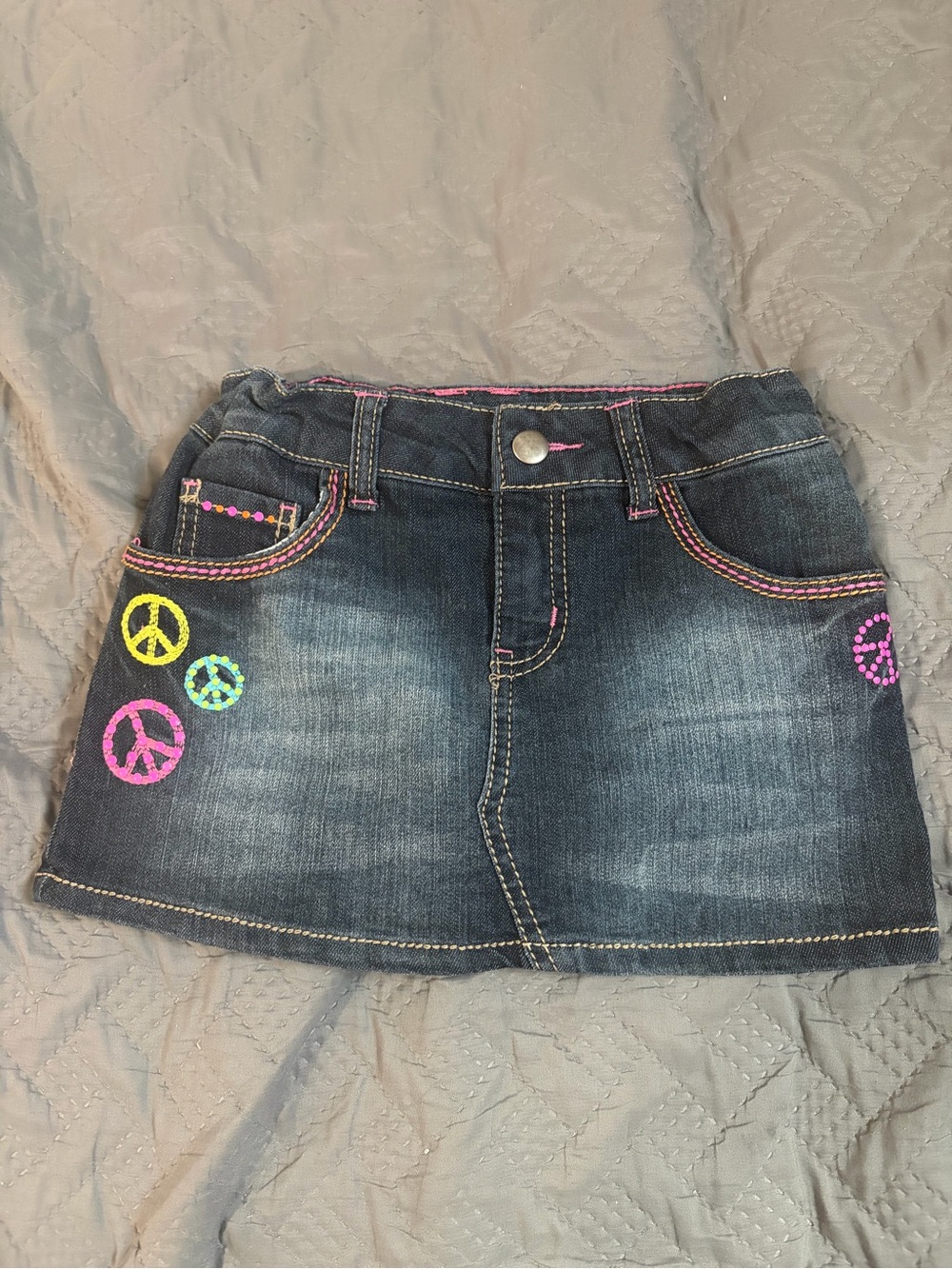 Circo Dark Blue Denim Skirt with Neon Peace Sign Accents